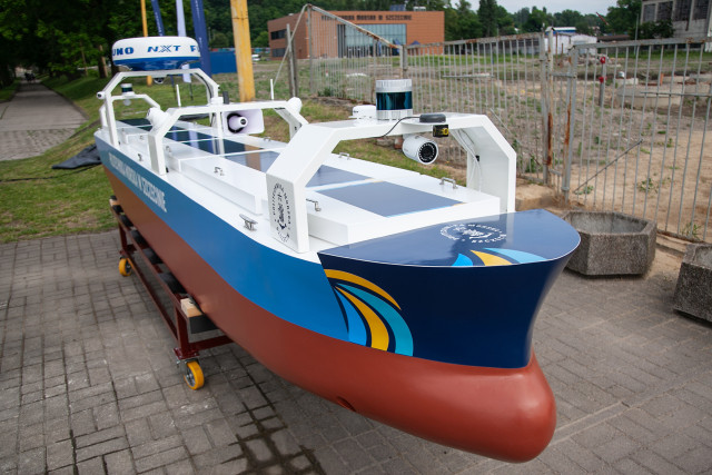 Large-scale ship model on the quay 